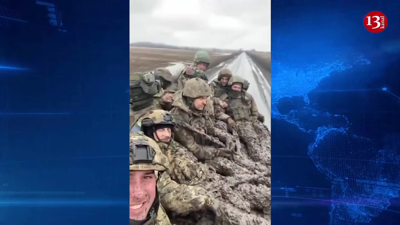 Ukrainian soldiers returning from battle covered in mud, tired and smiling-“History’s being written"