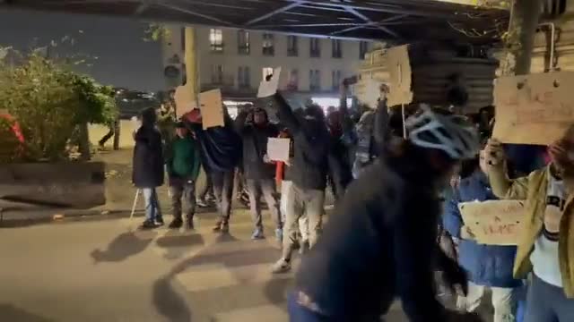 Brown blocked roads in Paris last night as they demand free housing and that they have rights