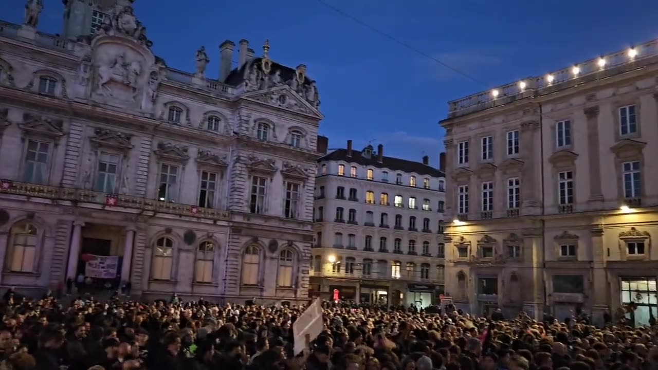 Lyon, France… Massive crowds chant “standing up raises you”…