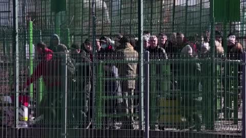 'It's hard to process': Ukrainians flee to Poland