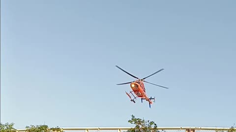 medical helicopter takeoff from helipad