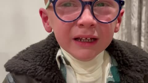 Little Boy Overwhelmed by Visit From Santa