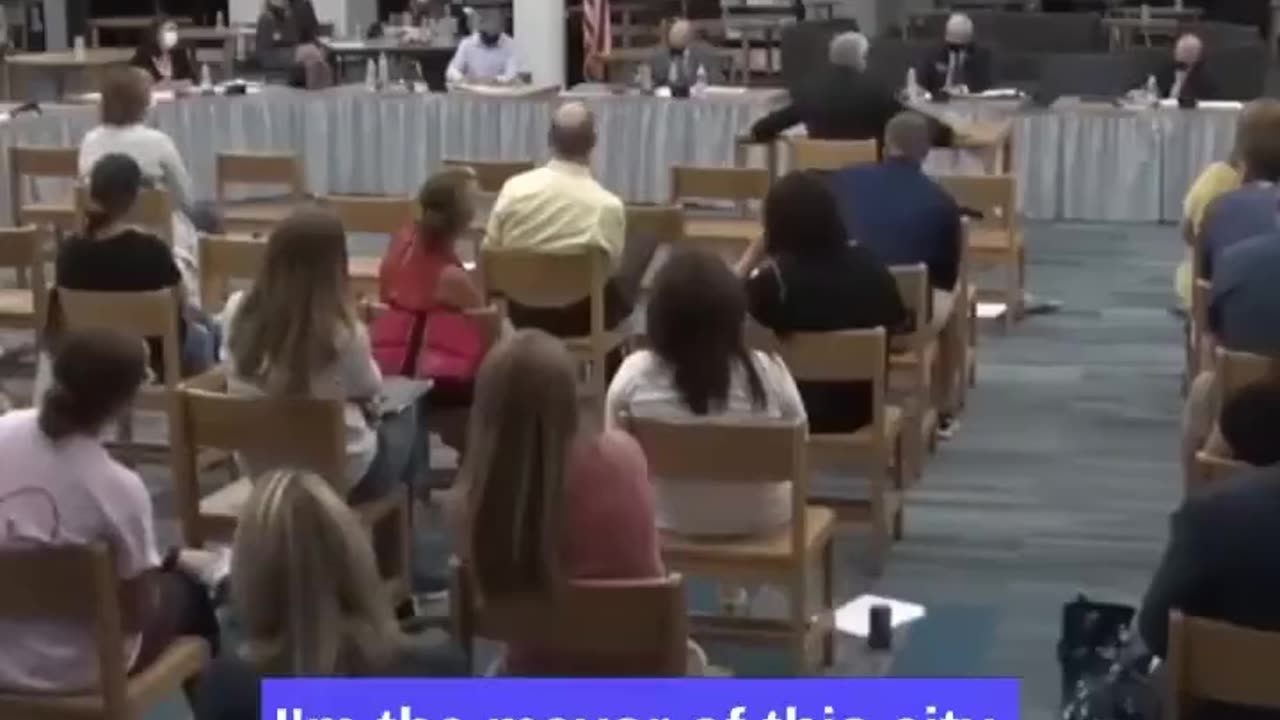 Mayor at a School board meeting gives a warning to the staff