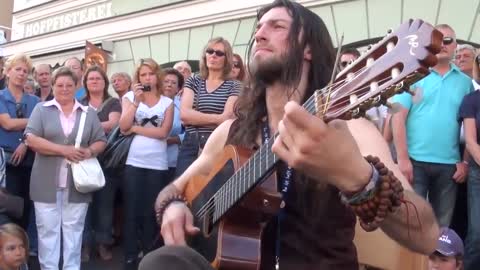 Best Street Guitar Performance Hundreds flock to watch this street performer and you can see why!