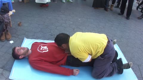 Luodong Massages Attractive White Man On Sidewalk