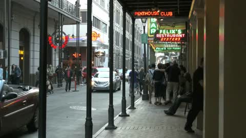 New Orleans French Quarter Cars On Street Evening