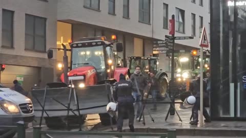 Farmers have smashed through barriers at EU HQ in Brussels.