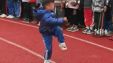 10-year-old boy demonstrates martial arts