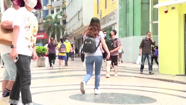 Macau shuts most businesses amid COVID outbreak