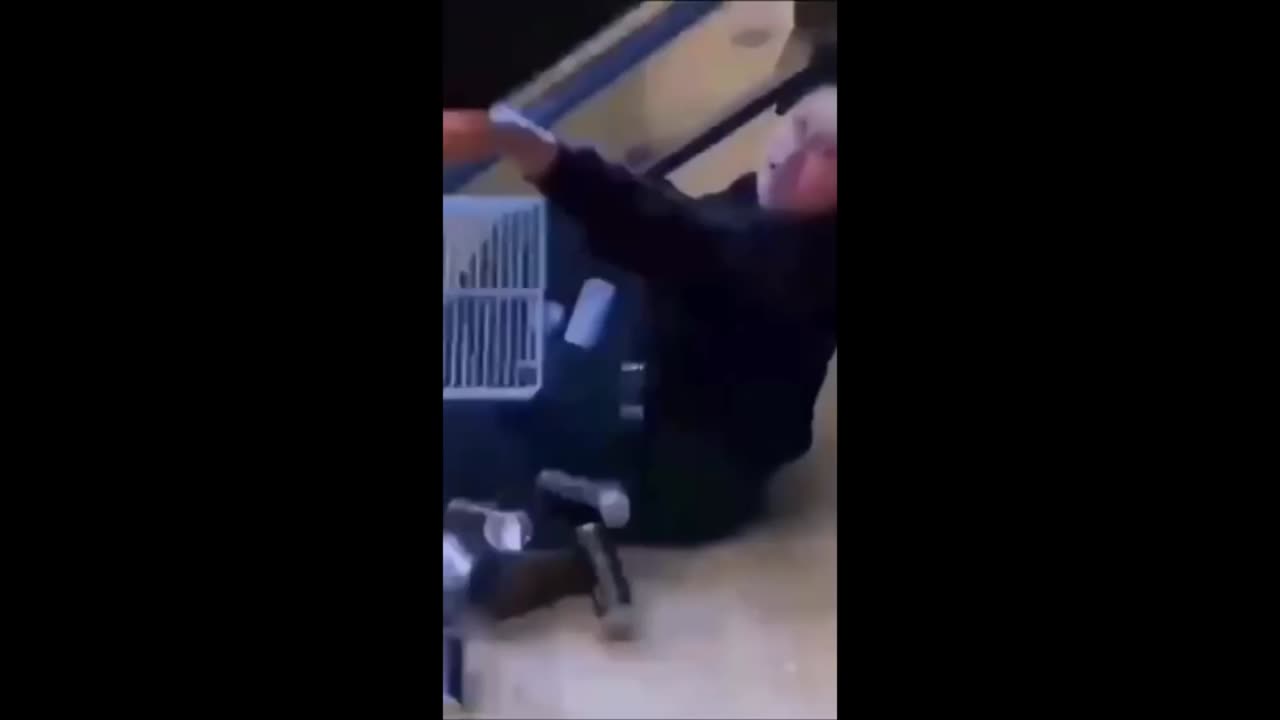 Chick hangs off alcohol fridge door then this happens.mp4