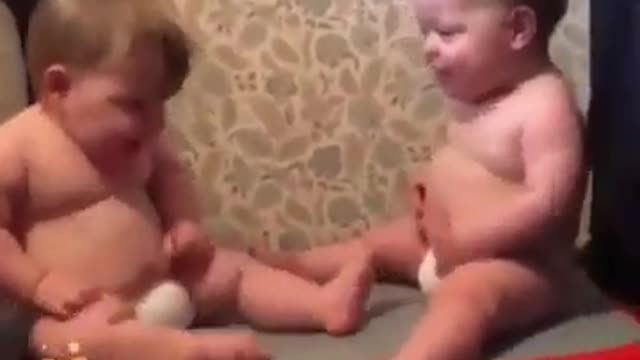 Two Babies in the Power Fit Machine