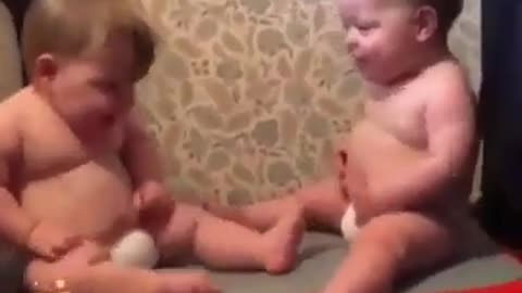 Two Babies in the Power Fit Machine