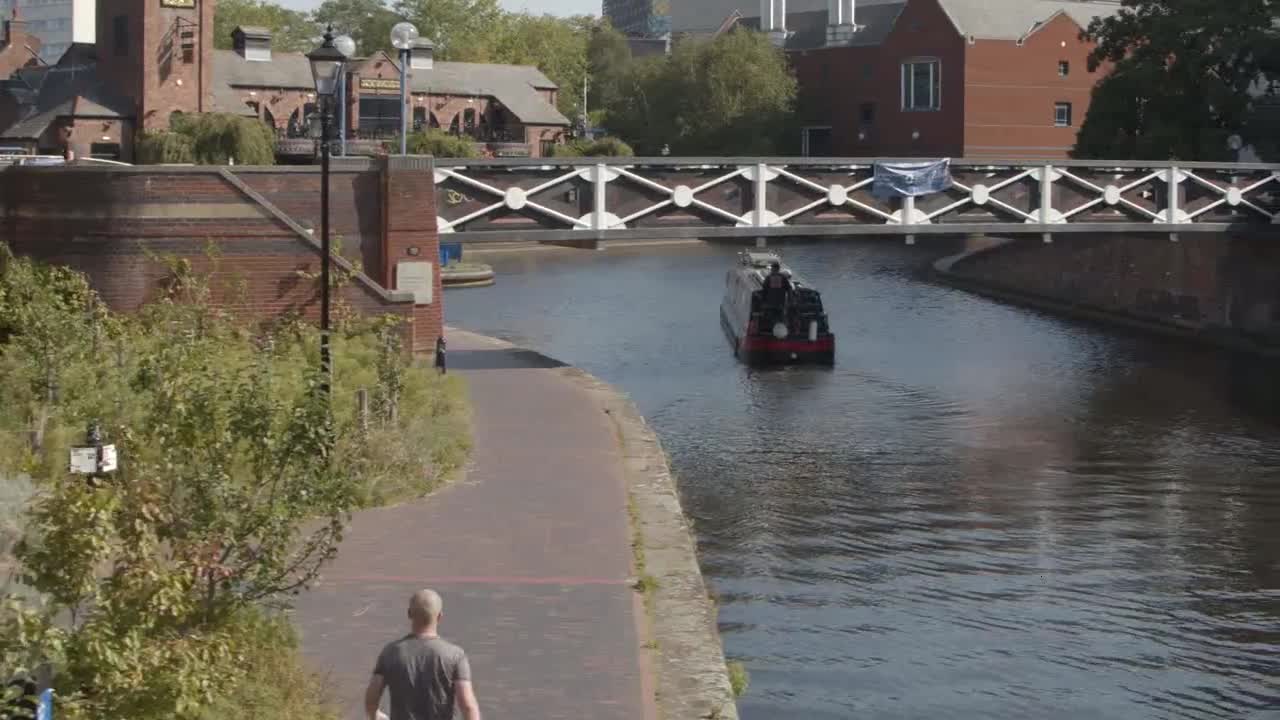 Panning Shot of Canal Boat In Birmingham Canal