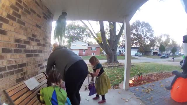 Old Lady and Kids Empty Buckets of Candy for Themselves