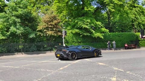 Bikers gatecrashing the Lambo's moment