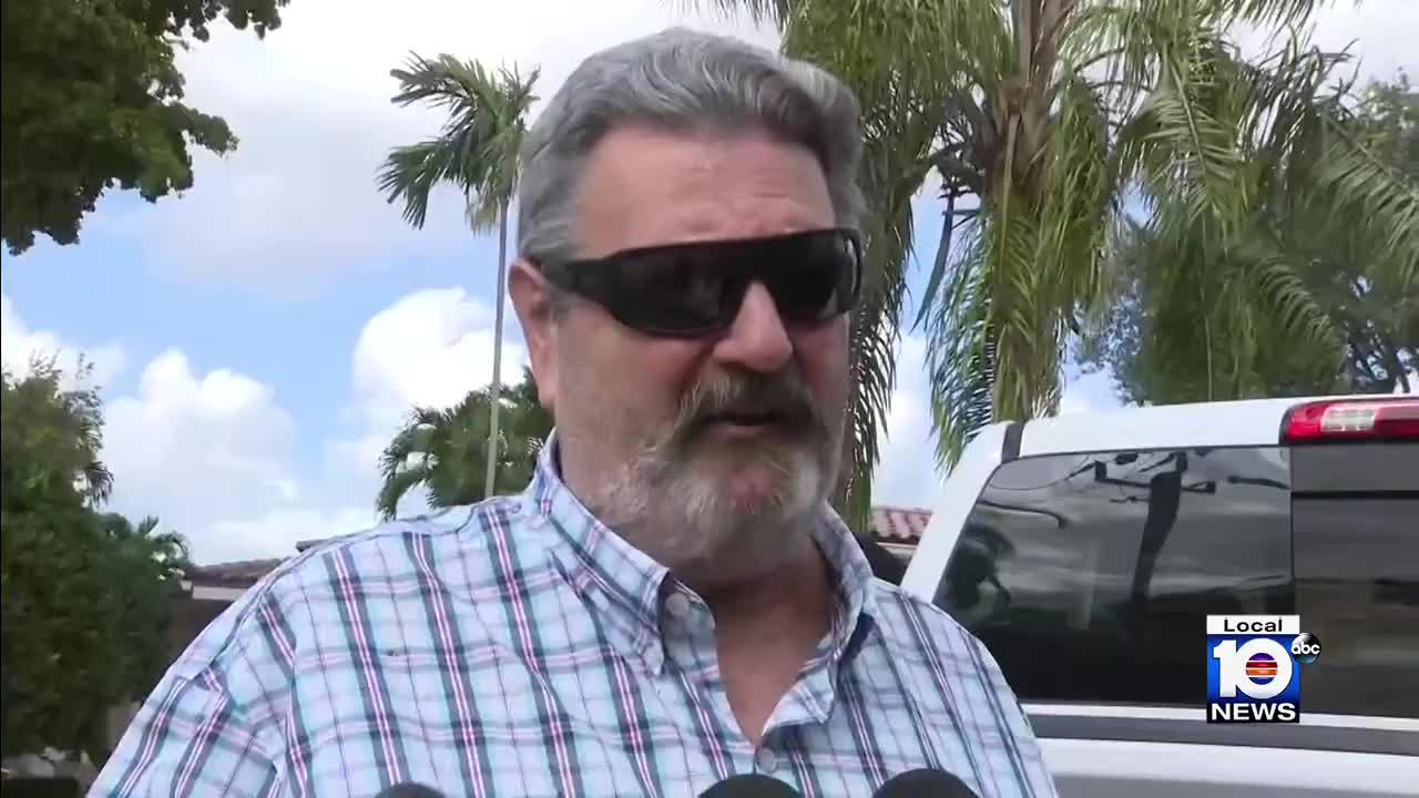 Police still outside Coral Gables home of man accused of threatening officer