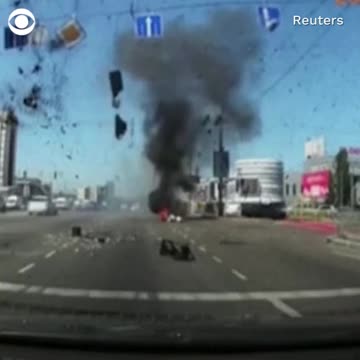 Missile Falls Next to Traveling car in Kyiv, Ukraine.
