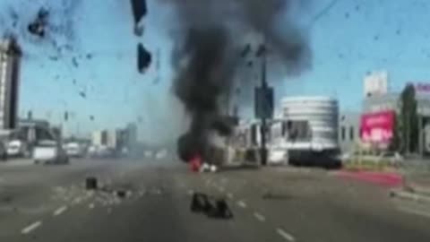 Missile Falls Next to Traveling car in Kyiv, Ukraine.