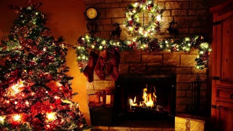 Christmas cozy evening. The crackling of the fire in the fireplace.