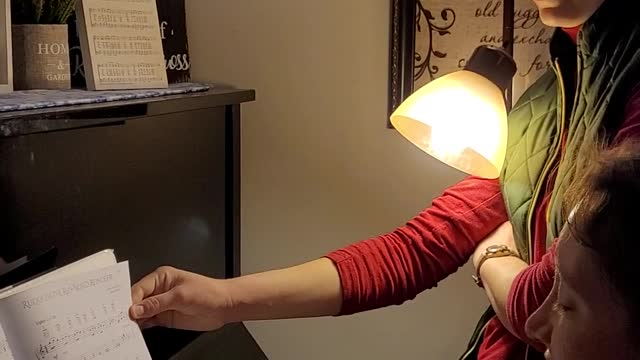 Christmas singing around the piano