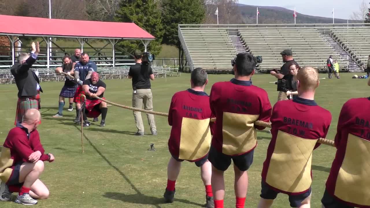 World's Strongest Men in a Tug o' War Challenge at Braemar Gathering Highland Games site in Scotland