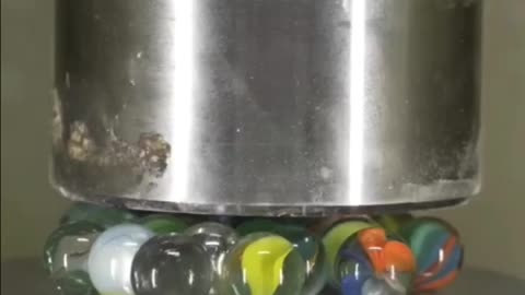 Crushing crayons and balls with hydraulic press