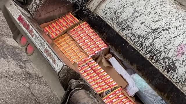 Crushing Milk in a Garbage Truck Compactor