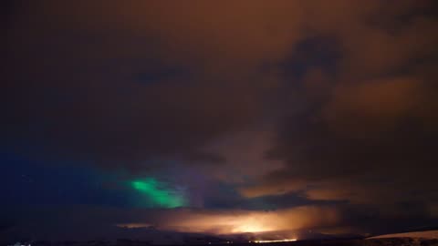 Aurora behind clouds