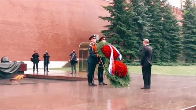 Russian President Standing in Heavy Raining