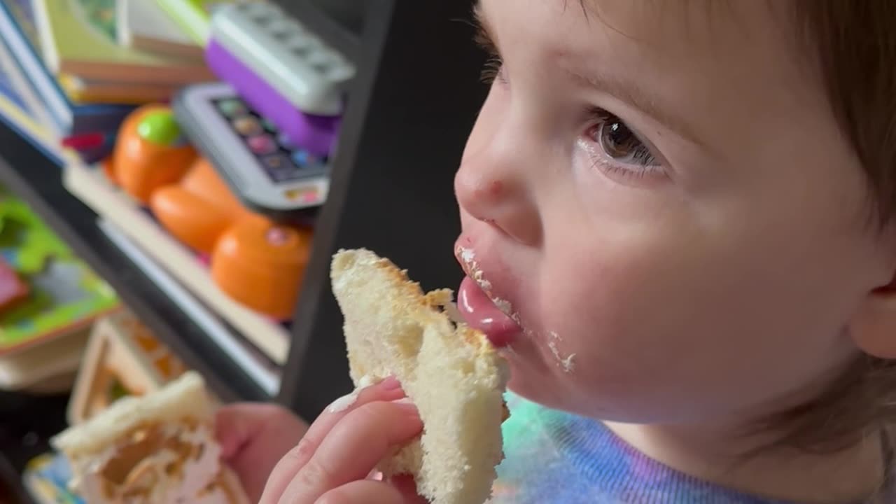 This is how she eats her sandwich?