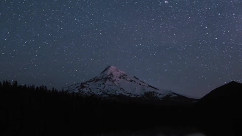 Mountain under stars