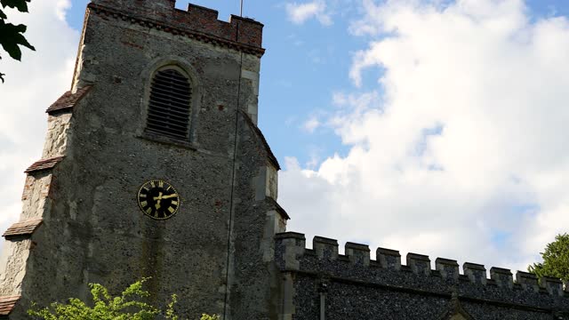 Nice Time Lapse Video of a Working Clock On A Tower During the Day.