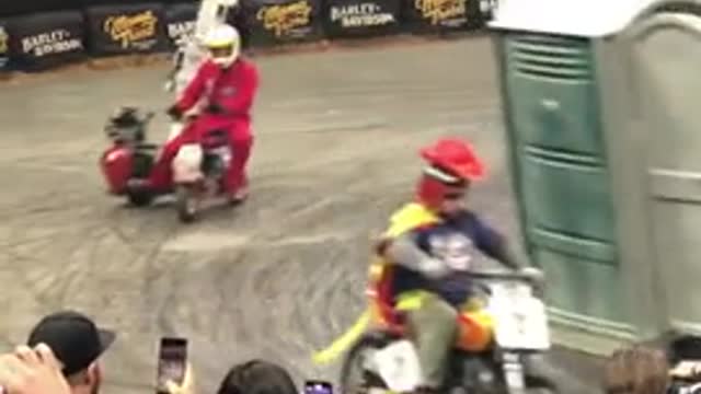 Funny vehicle race. Racing in a toilet seat