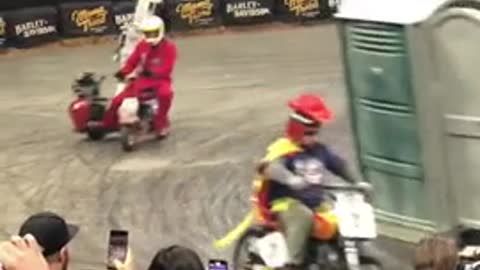 Funny vehicle race. Racing in a toilet seat