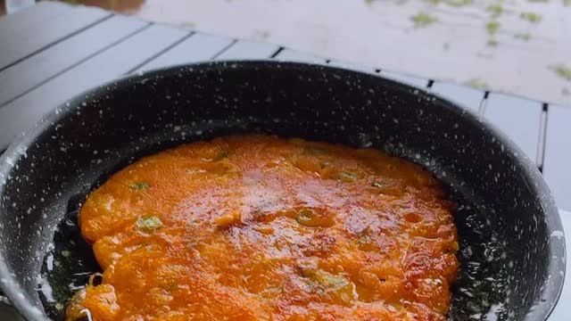 Kimchi pancake, a traditional Korean food you eat on a rainy day.