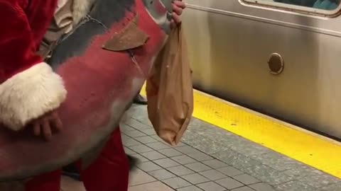 Old man hat red suite large fish whistling
