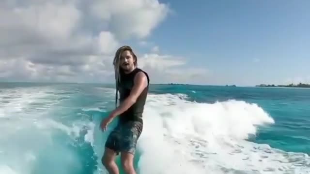 Surf with dolphins..WOW! What a wonderful experience