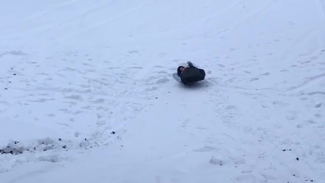 Sleeping bag sledding!