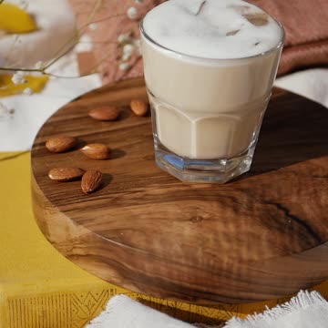 Dipping Cinnamon Roll to the Cold Coffee