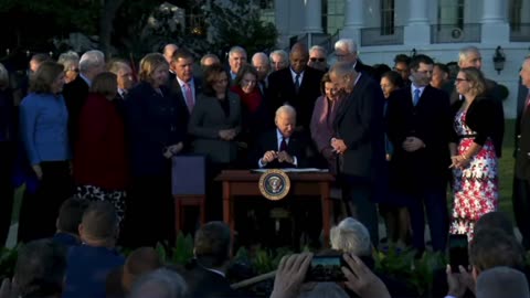 Biden can't find his mask before signing his Build Back Better agenda into law