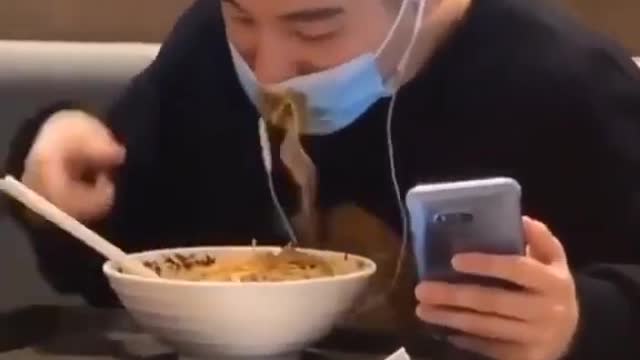 Funny mask man eating a noodles protect covid 19