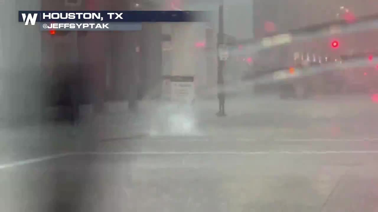 Heavy rain in Houston is causing flooding and water to come through manhole covers!