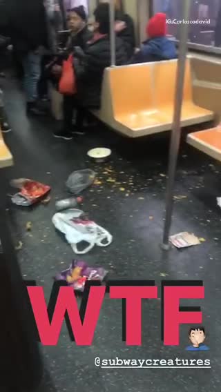 Subway train floor dirty with trash and food