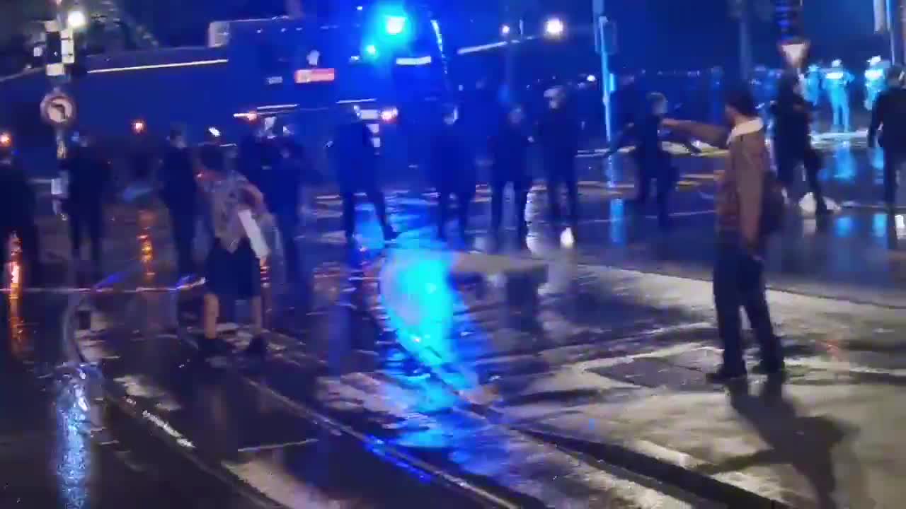 Switzerland - Water cannon deployed on anti "covid passport" protesters Tonight