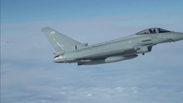 F-16 And Eurofighter Typhoon escorting B-52