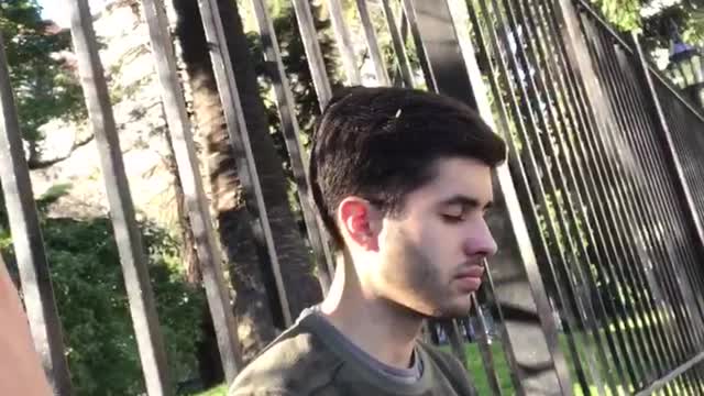 Blue jean jacket guy tries to scare friend by touching leg fails