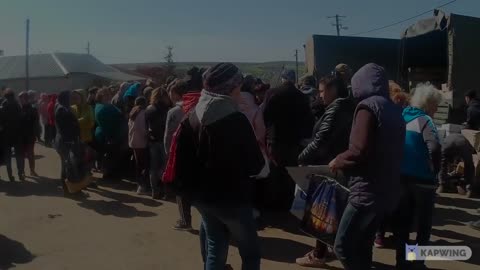 Russian forces bring supply to the civilians