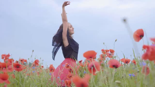 girl dancing in garden enjoying the nature