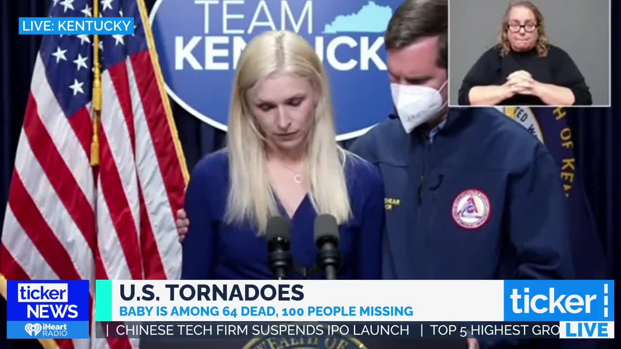 Kentucky First Lady Britainy Beshear breaks down at the podium while addressing the tornado impacts.