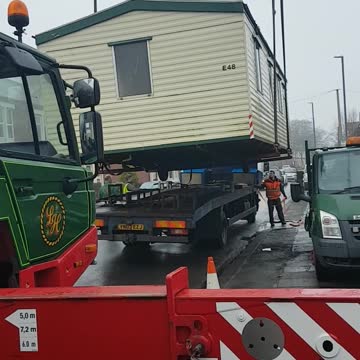 Static caravan being craned into position #7